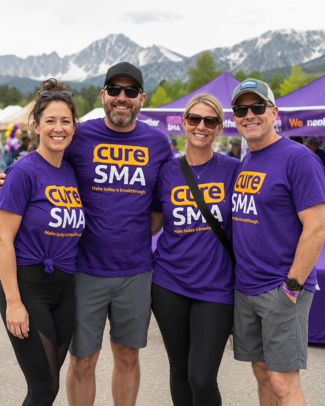 Four Scottish Group team members in Cure SMA shirts at the annual Colorado golf tournament fundraiser